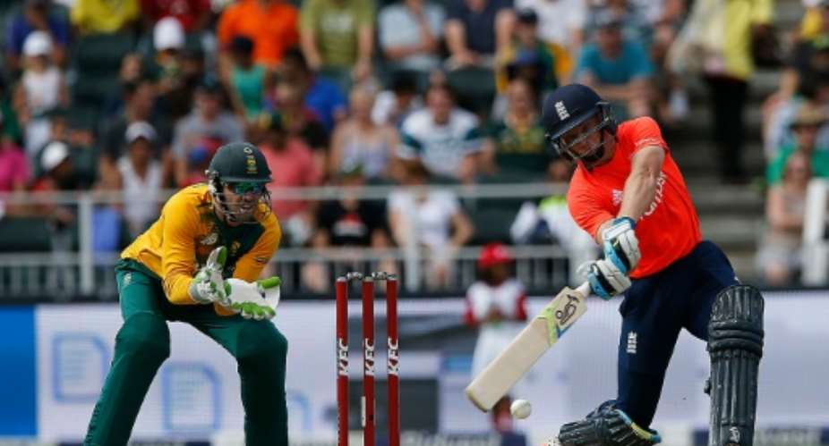 England batsman Jos Buttler swings during the second T20 between South Africa and England at Wanderers Stadium in Johannesburg on February 21, 2016.  By Marco Longari (AFP)