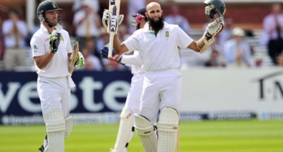 South Africa's Hashim Amla celebrates his century during the fourth day of the third International Test cricket match.  By Glyn Kirk AFP