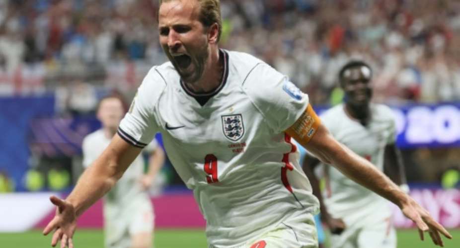 Englands Harry Kane celebrates after scoring the winning goal in a 2-1 defeat of DR Congo.  By Odd ANDERSEN (AFP)