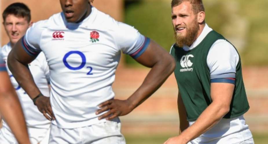 England's winger Brad Shields R, seen with teammtes during the captain's run at the Saint Stithians College in Johannesburg on June 8, 2018, on the eve of their first Test match against South Africa.  By Christiaan Kotze AFPFile
