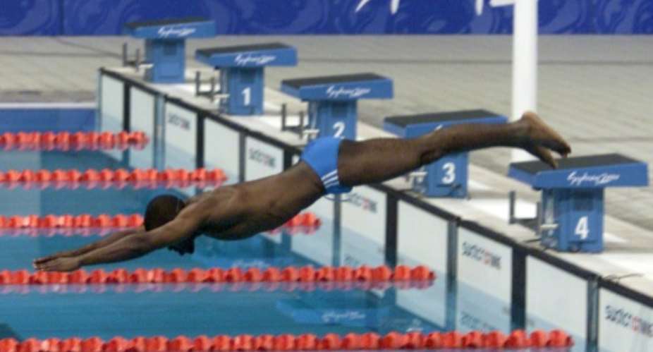 Eric Moussambani swum his Olympic 100m heat alone in front of a crowd of 17,000.  By ANTONIO SCORZA AFPFile