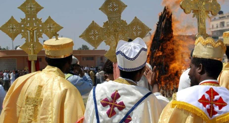 Eritrean Orthodox priests take part in the ancient festival of Meskel in 2007.  By PETER MARTELL (AFP)