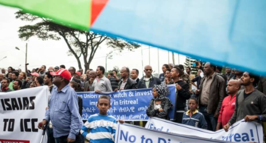 Hundreds of Eritreans demonstrate in front of the African Union headquarters in support of the UN Inquiry report and asking for measures to be taken against Eritrea in Addis Ababa on June 26, 2015.  By Nichole Sobecki AFP
