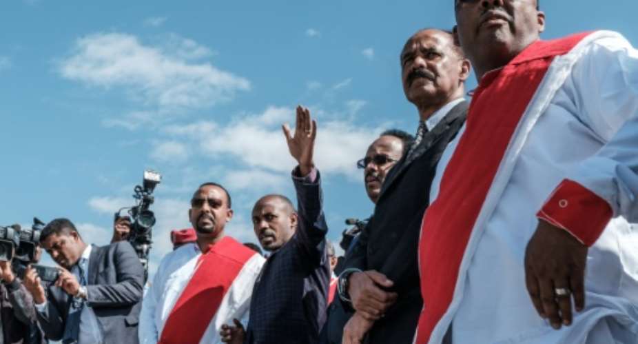 Eritrea's President Isaias Afwerki 2R, Ethiopia's Prime Minister Abiy Ahmed 5R have been engaged in a process of reconciliation.  By EDUARDO SOTERAS AFP