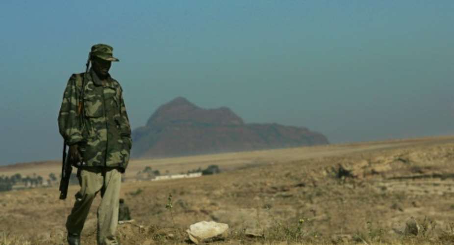 An Ethiopian soldier patrols near the Eritrean border in the northern town of Zala Anbesa in the Tigray region on November 19, 2005.  By Marco Longari AFPFile