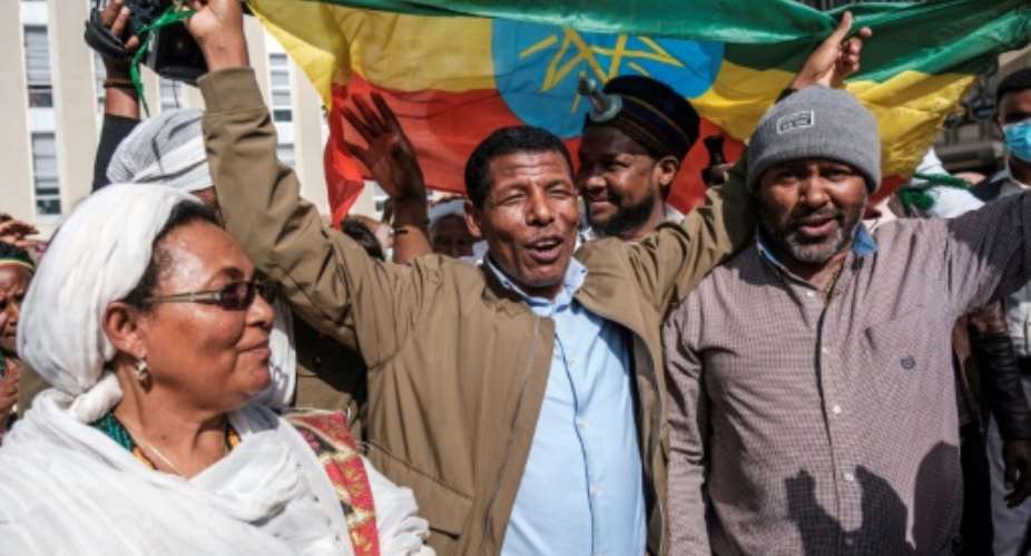 Ethiopian former long distance runner Haile Gebrselassie C has said he is determined to sacrifice and stand for Ethiopia.  By EDUARDO SOTERAS AFP