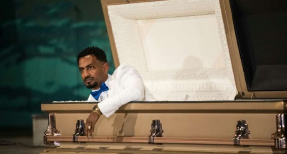 Ethiopian migrant  Zekarias Mesfin surprised his audience by arriving in a coffin to the premiere of his film depicting his migration across Sudan and Egypt.  By Zacharias ABUBEKER AFP