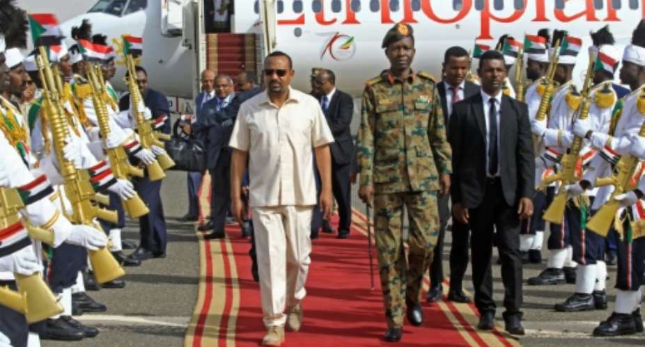 Ethiopian Prime Minister Abiy Ahmed's mission to revive talks between Sudan's military rulers and protest leaders comes days after a deadly crackdown drew international condemnation of the generals.  By ASHRAF SHAZLY AFP