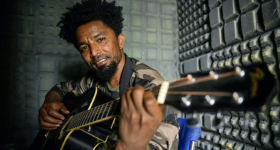 Ethiopian Tigrayan reggae singer Solomon Yikunoamlak's new ballad calls for unity in his native Tigrayan.  By Michael TEWELDE AFP