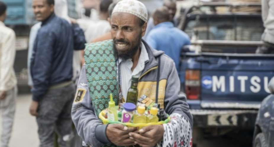 Ethiopians are struggling after currency reform sparked rising prices.  By Amanuel Sileshi (AFP)