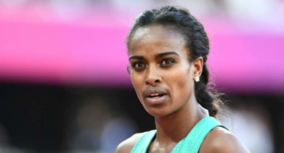 Ethiopias Genzebe Dibaba finishes the semi-finals of the womens 1,500m at the 2017 IAAF World Championships in London on August 5, 2017.  By Jewel SAMAD (AFP)