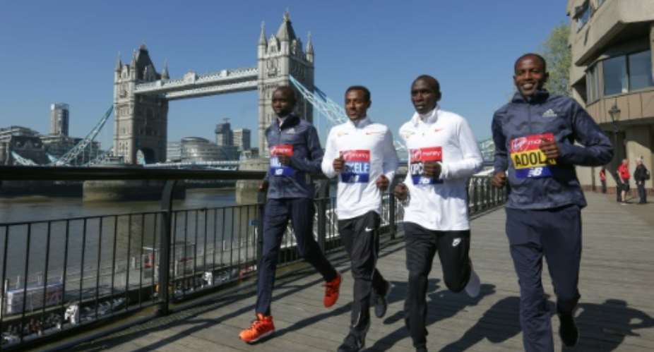 Ethiopia's Kenenisa Bekele second left will go head to head against Kenya's Eliud Kipchoge third left in the 2020 London Marathon.  By Daniel LEAL-OLIVAS AFPFile