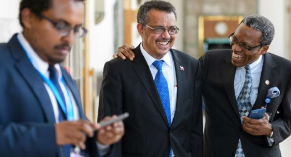 Ethiopia's Tedros Adhanom, centre, after addressing delegates at the World Health Organization assembly in Geneva on Tuesday.  By Fabrice COFFRINI AFP