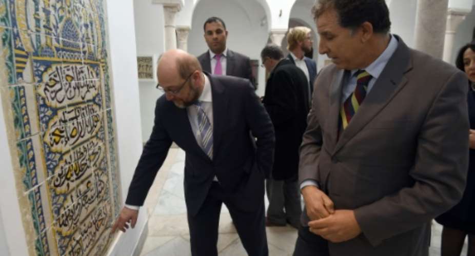 European Parliament President Martin Schulz L, during a visit to the National Bardo Museum on February 8, 2016 in Tunis, praised the democratic advances written into Tunisia's new constitution.  By Fethi Belaid AFP