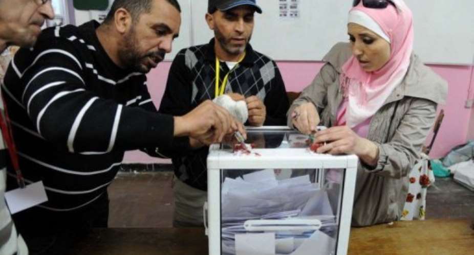 Officials start counting the votes in Algiers.  By Farouk Batiche AFPFile