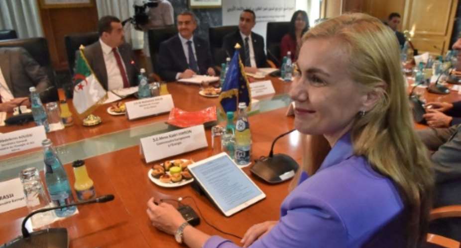 European Union's energy commissioner Kadri Simson R and members of her delegation attend a meeting with Algeria's Minister of Energy and Mines Mohamed Arkab.  By - AFP