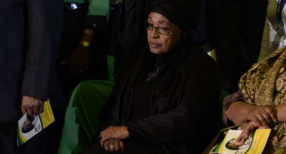 The ex-wife of Nelson Mandela, Winnie Mandela Madikizela, attends a farewell service for the former South African president on December 14, 2013, in Pretoria, South Africa.  By Stephane de Sakutin AFPFile