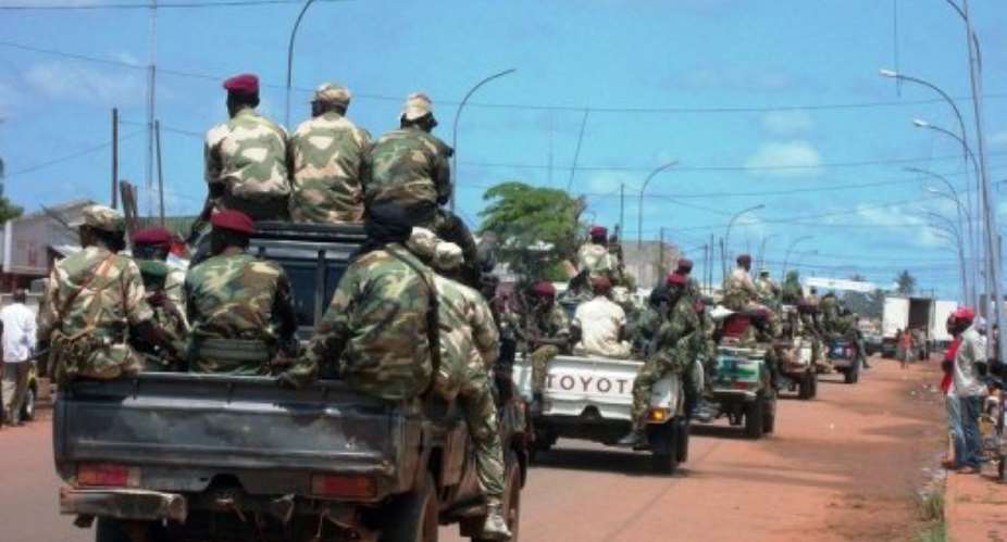 Central African troops drive through the streets of Bangui, on September 5, 2013.  By Pacome Pabandji (AFP/File)