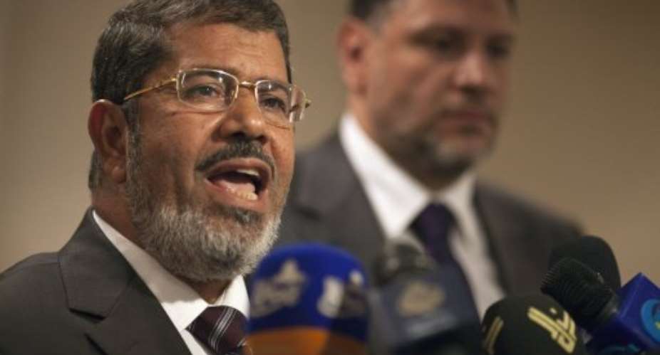 Mohammed Mursi won the first-round with 5,764,952 votes.  By MARCO LONGARI AFPFile