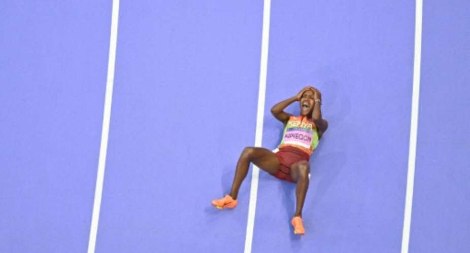 Faith Kipyegon made history at the Paris Games by becoming the first woman to win three consecutive 1,500 Olympic gold medals.  By Antonin THUILLIER (AFP/File)