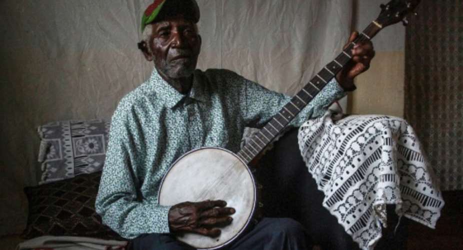 Fame at 92: Malawian music legend Giddes Chalamanda has notched up millions of views on TikTok.  By Amos Gumulira AFP