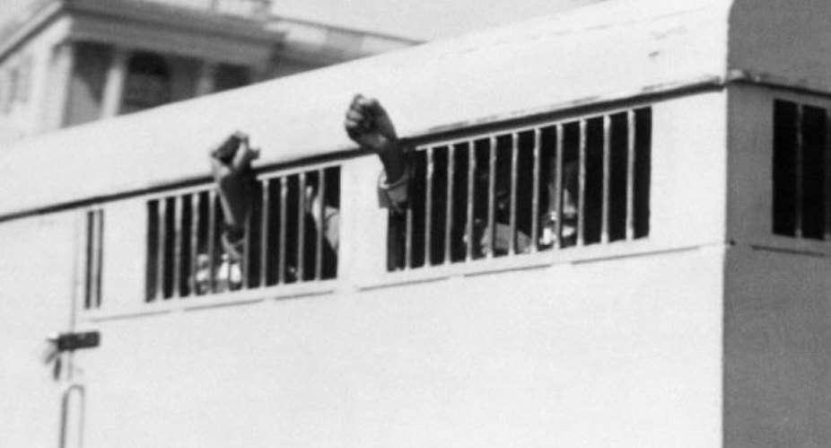 Eight men, among them Nelson Mandela, sentenced to life imprisonment, leave the Palace of Justice in 1964.  By  AFPFile