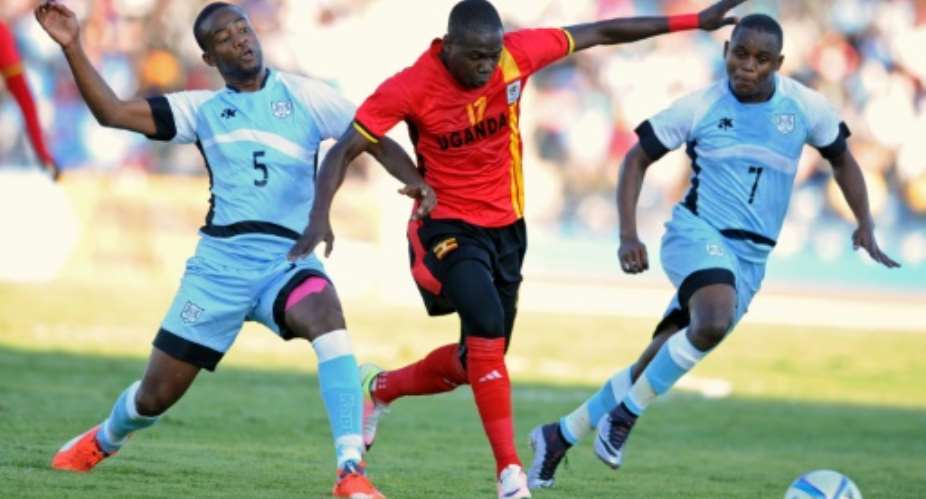 Farouk Miya centre scored the winner for Uganda against Comoros.  By Monirul Bhuiyan AFP