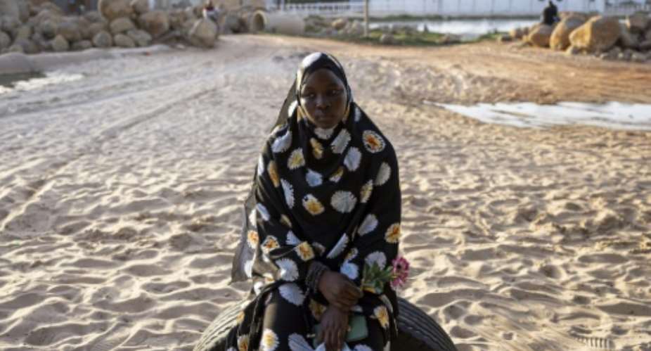 Fatou Falls husband died in a migrant boat after leaving Senegal.  By PATRICK MEINHARDT (AFP)