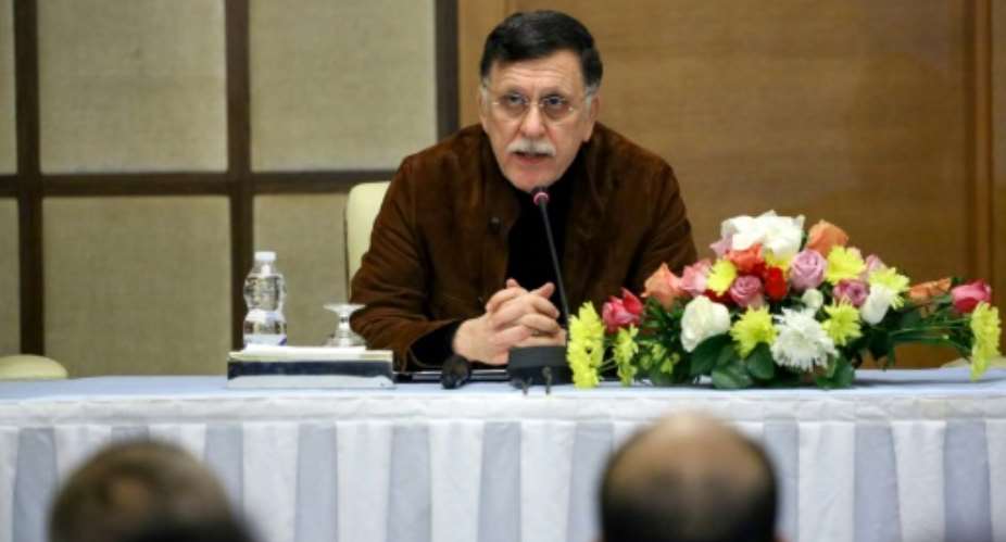 Fayez al-Sarraj, head of Libya's Government of National Accord, will participate in a peace conference on Libya in Berlin, but his rival Khalifa Haftar has not confirmed his attendance.  By Mahmud TURKIA AFP