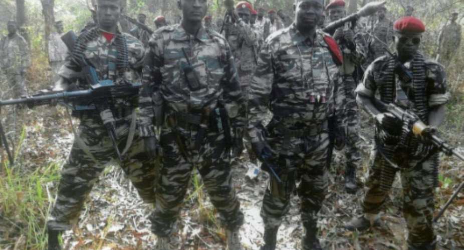 FDPC leader Abdoulaye Miskine2R, pictured with his fighters in a photo released in 2013 by the FDPC has been hit with UN sanctions which include an asset freeze and travel ban.  By - FDPCAFPFile