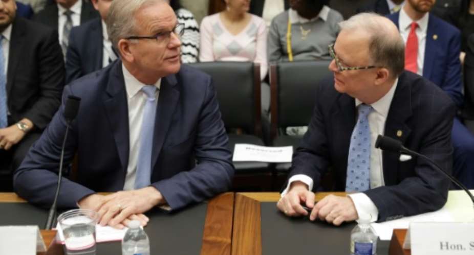 Federal Aviation Administration acting Administrator Daniel Elwell L and National Transportation Safety Board Chairman Robert Sumwalt talk before testifying at a House panel on the Boeing 737 MAX.  By CHIP SOMODEVILLA GETTY IMAGES NORTH AMERICAAFP