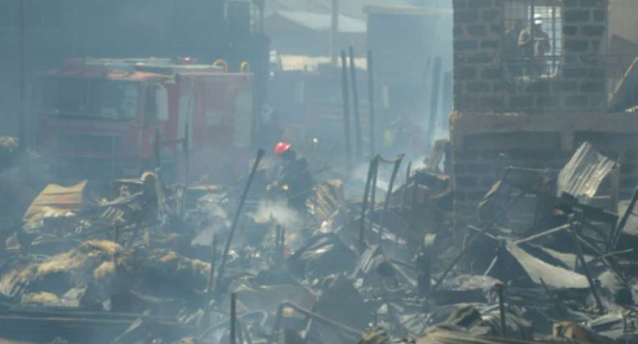 Fifteen people died and 70 were injured by the fire in Gikomba market in Nairobi.  By SIMON MAINA AFP