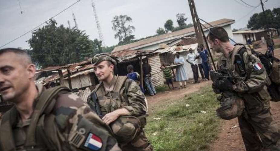 Soldiers of the French Sangaris force patrol in the town of Boda, in the south of the country, on July 24, 2014.  By Andoni Lubaki AFPFile