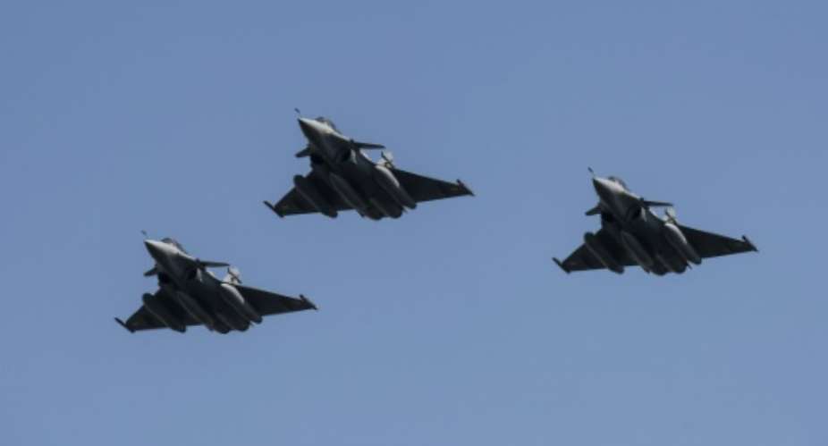 Three Rafale fighter jets fly above Cairo, on July 21, 2015.  By Khaled Desouki AFP