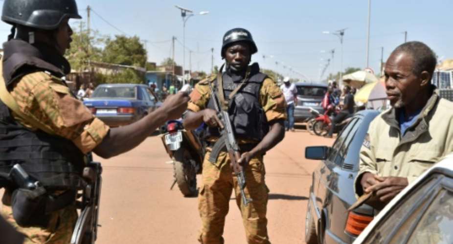 Burkina Faso's security forces patrol in the streets of Ouagadougou on November 28, 2015, on the eve of presidential elections.  By Issouf Sanogo AFP