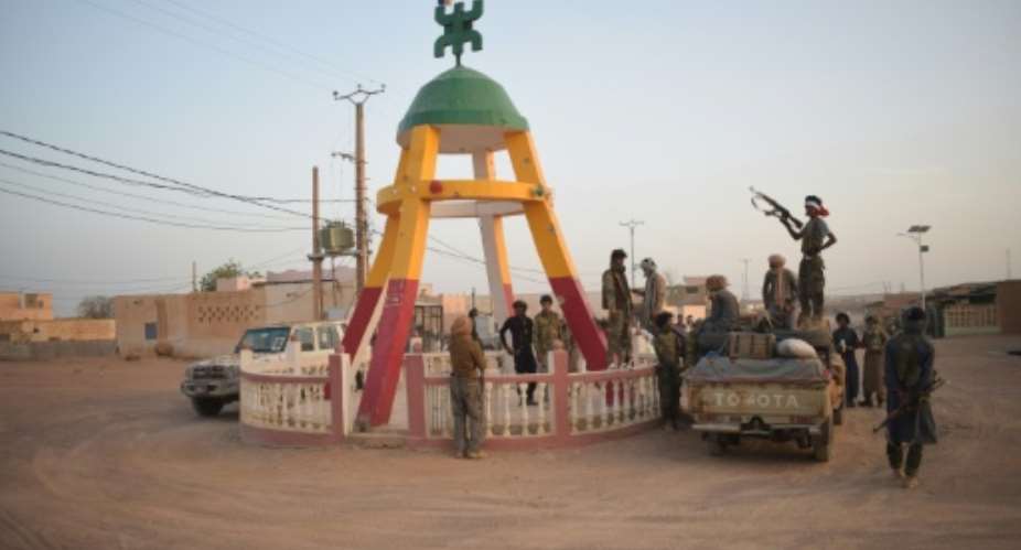 FLA rebels assemble around a roundabout in Kidal on April 26, 2026.  By abdollah Ag Mohamed (AFP/File)