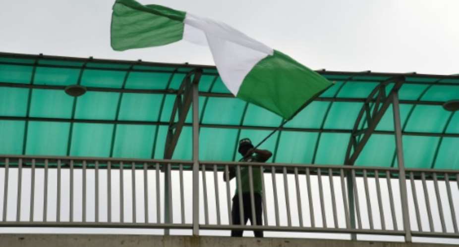 'Flagboii' Akinwunmi Ibrahim Adebanjo became a symbol of the protest movement.  By PIUS UTOMI EKPEI AFP