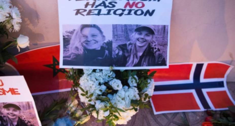 Flowers, pictures and flags in tribute to two young Scandinavian women killed while hiking in Morocco in December 2018.  By FADEL SENNA AFPFile