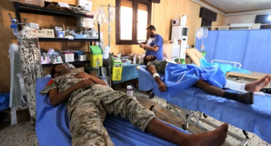 Forces allied to Libya's UN-backed Government of National Accord GNA are seen in a field hospital in Sirte during their military operation to clear the Islamic State group's jihadists from the city on October 14, 2016.  By Mahmud Turkia AFP
