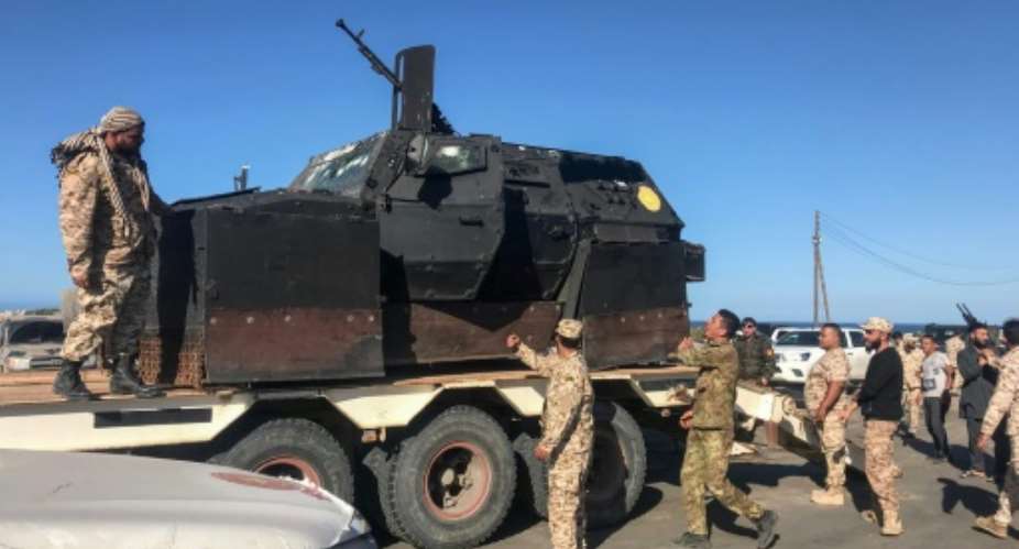 Forces loyal to Libya's UN-backed unity government have sent reinforcements to push back an advance on Tripoli by fighters of strongman Khalifa Haftar.  By Mahmud TURKIA AFP