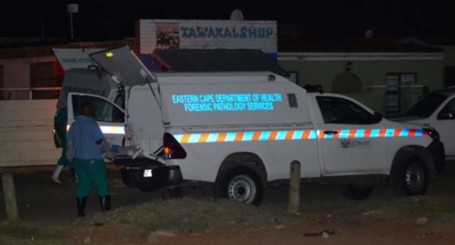 Forensic pathologists at the scene. The latest killing is the second mass shooting in Gqeberha, formerly Port Elizabeth, since November.  By Luvuyo Mehlwana AFPFile