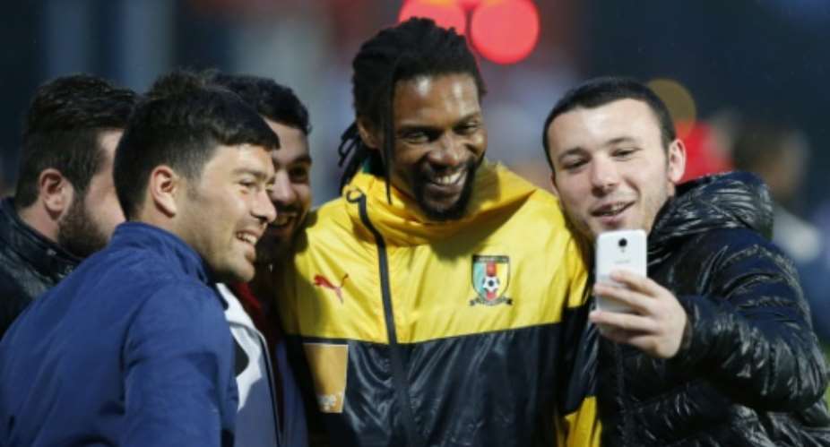 Former Cameroon star Rigobert Song C, pictured May 2014 is coaching the Olympics squad, who are expected to emerge overall winners in the second leg of a first-round qualifier for the 2020 Tokyo Games.  By PIERRE TEYSSOT AFPFile