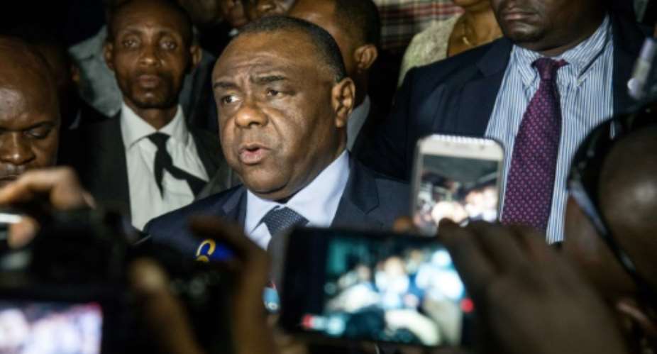 Former DR Congo warlord Jean-Pierre Bemba is heading back to Belgium after filing his candidacy for December's presidential election.  By Junior D. KANNAH AFPFile