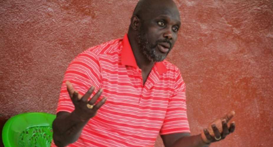 Former international Liberian soccer star turned politician, George Weah speaks during an interview in Monrovia on July 7, 2017.  By Zoom DOSSO AFPFile