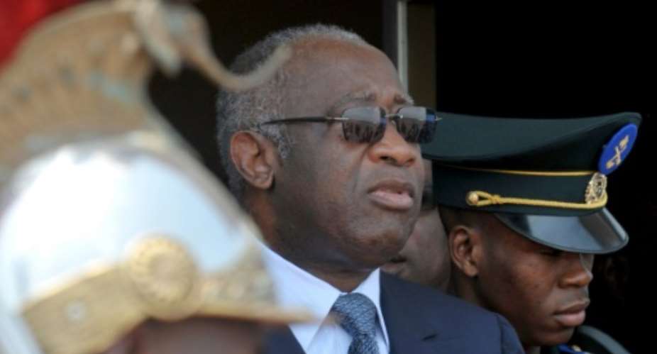 Former Ivorian president Laurent Gbagbo C is the first ex-head of state to be tried by the International Criminal Court.  By ISSOUF SANOGO AFPFile