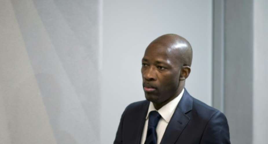 Former Ivory Coast political leader Charles Ble Goude faces a fresh trial by an Ivorian court.  By Peter Dejong POOLAFP
