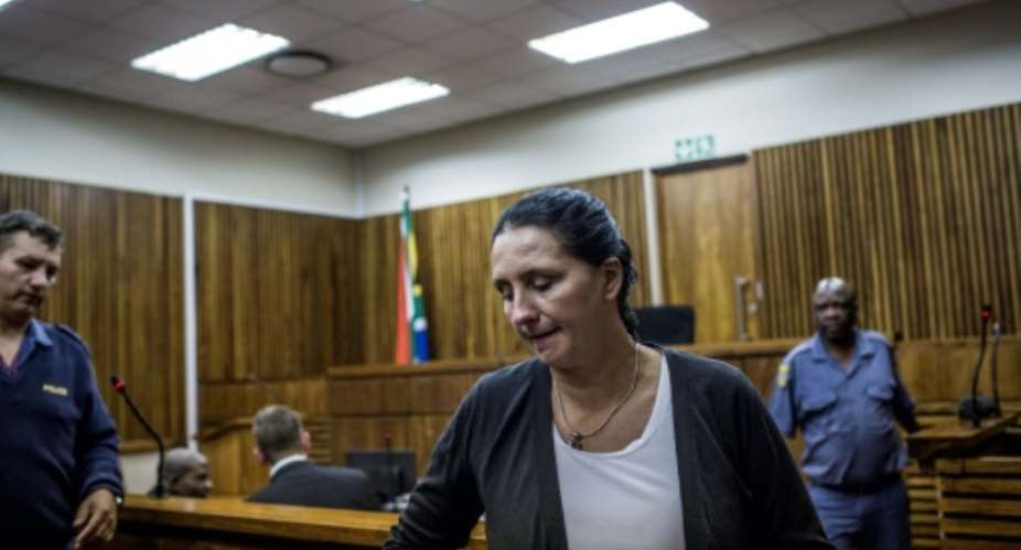 Former realtor Vicki Momberg, 49, was convicted for repeatedly hurling racist insults including the word kaffir at a black policeman.  By GULSHAN KHAN AFP