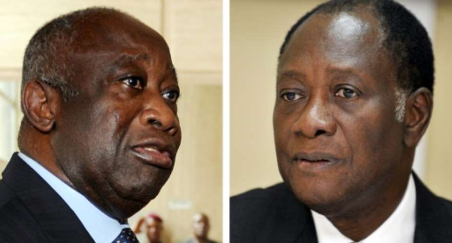 Former rivals: Gbagbo, left, and Ouattara.  By ISSOUF SANOGO, KAMBOU SIA AFP