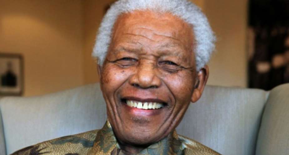 Former South African president and Nobel Laureate Nelson Mandela shown in a handout photograph released by the Nelson Mandela Foundation.  By DEBBIE YAZBEK MANDELA FOUNDATIONAFP