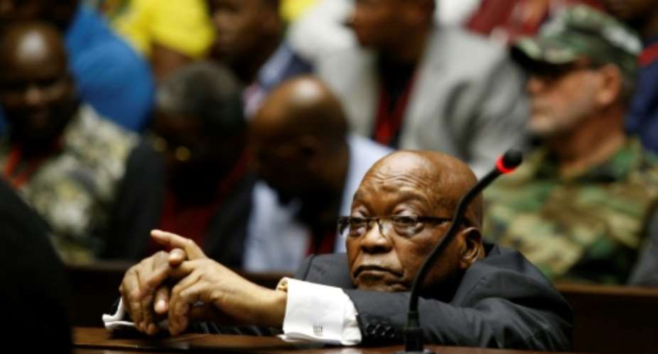 Former South African President Jacob Zuma, seen here in court, used the country's intelligence services for his own ends, notably targeting his successor Cyril Ramaphosa, a government report says.  By ROGAN WARD POOLAFPFile
